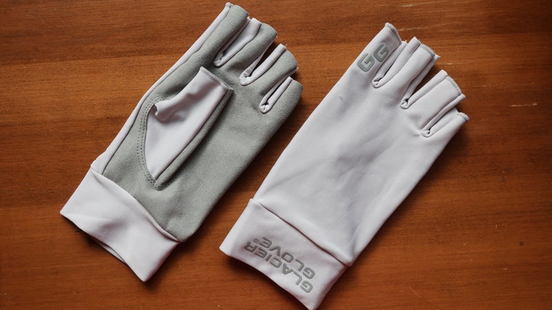 The Glacier Glove Ascension Bay Sun Gloves have a synthetic leather palm and polyester/Lycra top.