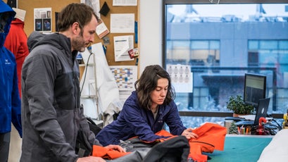 Arc’teryx design manager Greg Grenzke and apparel designer Brylee Geddis go over Alpha SV details at the Vancouver headquarters.