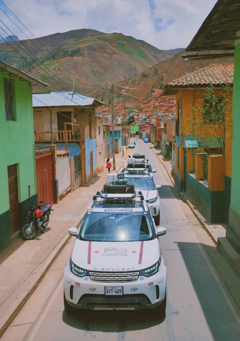 Fourteen new Land Rovers driving through town is the closest thing this small Peruvian village will ever experience to rush hour.