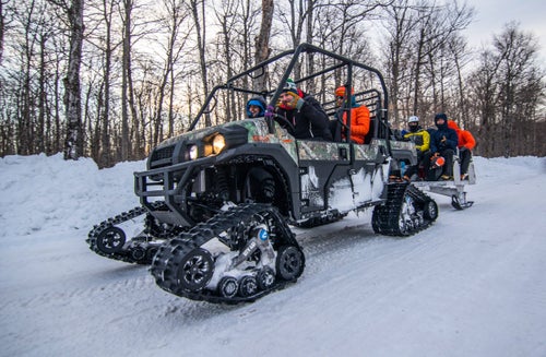 Some climbs are located deep in the back country. So how does one access the inaccessible? Why a five star limo ride of course. Back Country classes where shuttled out to the climbs via various off roading vehicles specifically designed for navigation in deep snow. In true upper Michigan style it was the perfect mix of classic local personality and first time excitement.