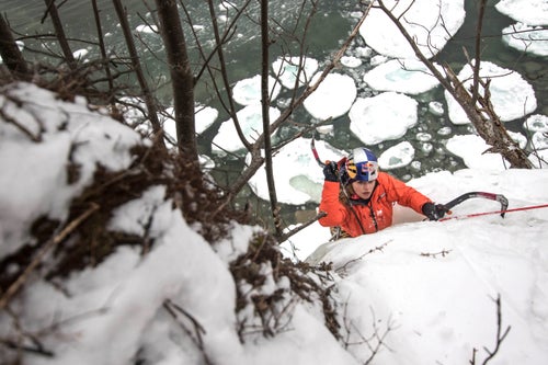 Sasha's focus was dialed, every swing calculated and perfectly placed to give her the maximum amount of security while topping out on a very wet pitch of ice located on Grand Island in Munising, Michigan. Her climbing partner and friend Angela VanWiemeersch had ascended the climb moments before and was now belaying Sasha.