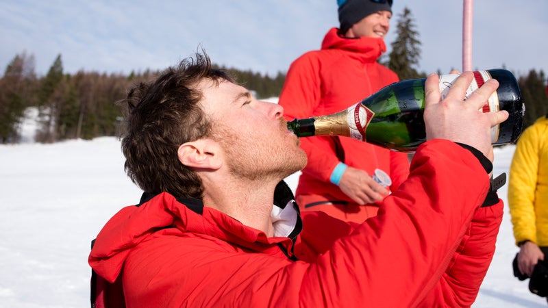 Foote takes a swig of champagne after breaking the world record.