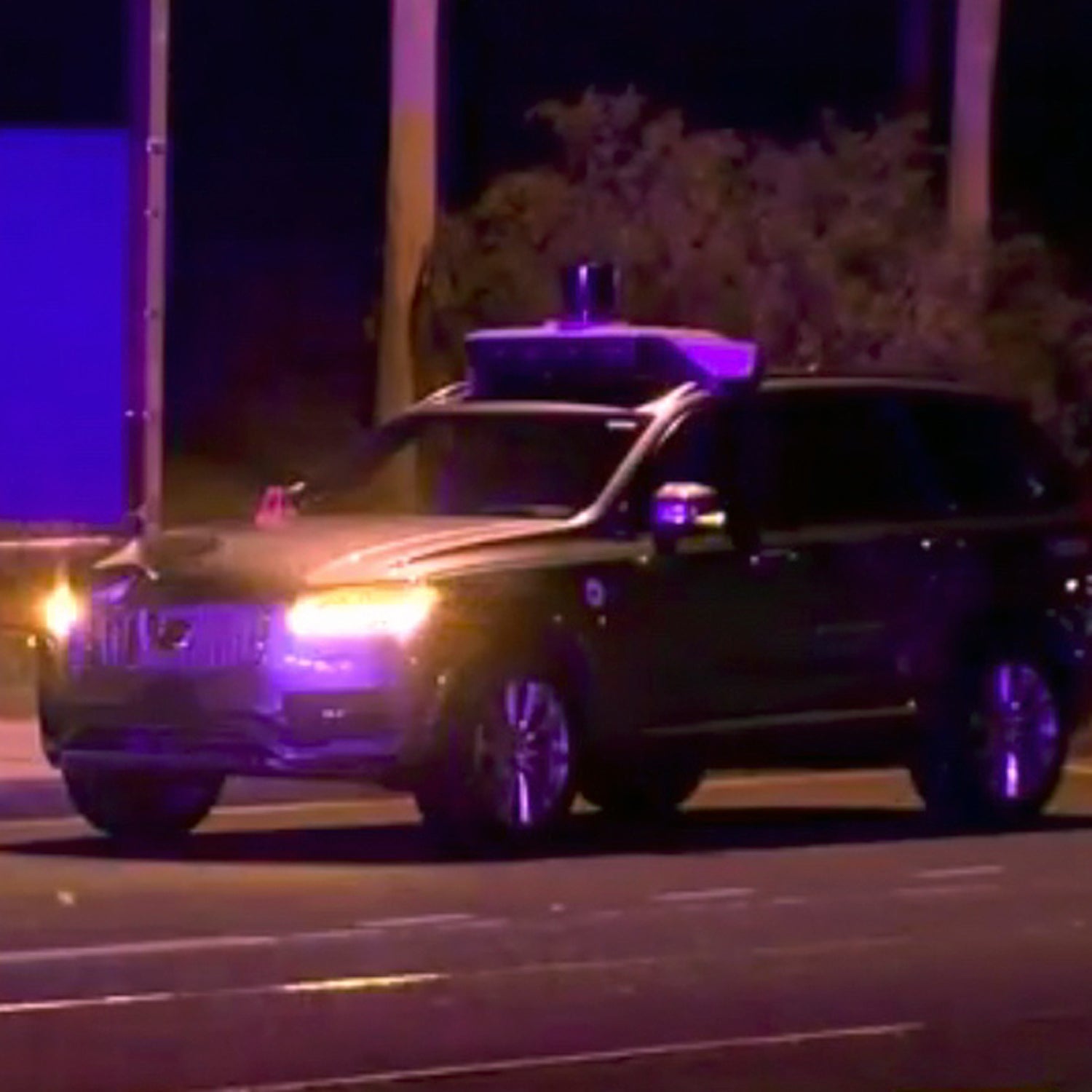 This March 19, 2018 still image taken from video provided by ABC-15, shows investigators at the scene of a fatal accident involving a self driving Uber car on the street in Tempe, Ariz. Police in the city of Tempe said that the vehicle was in autonomous mode with an operator behind the wheel when the woman walking outside of a crosswalk was hit.