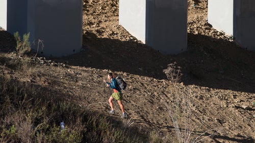 Thomas hiking under the Knott Memorial Bridge in San Diego