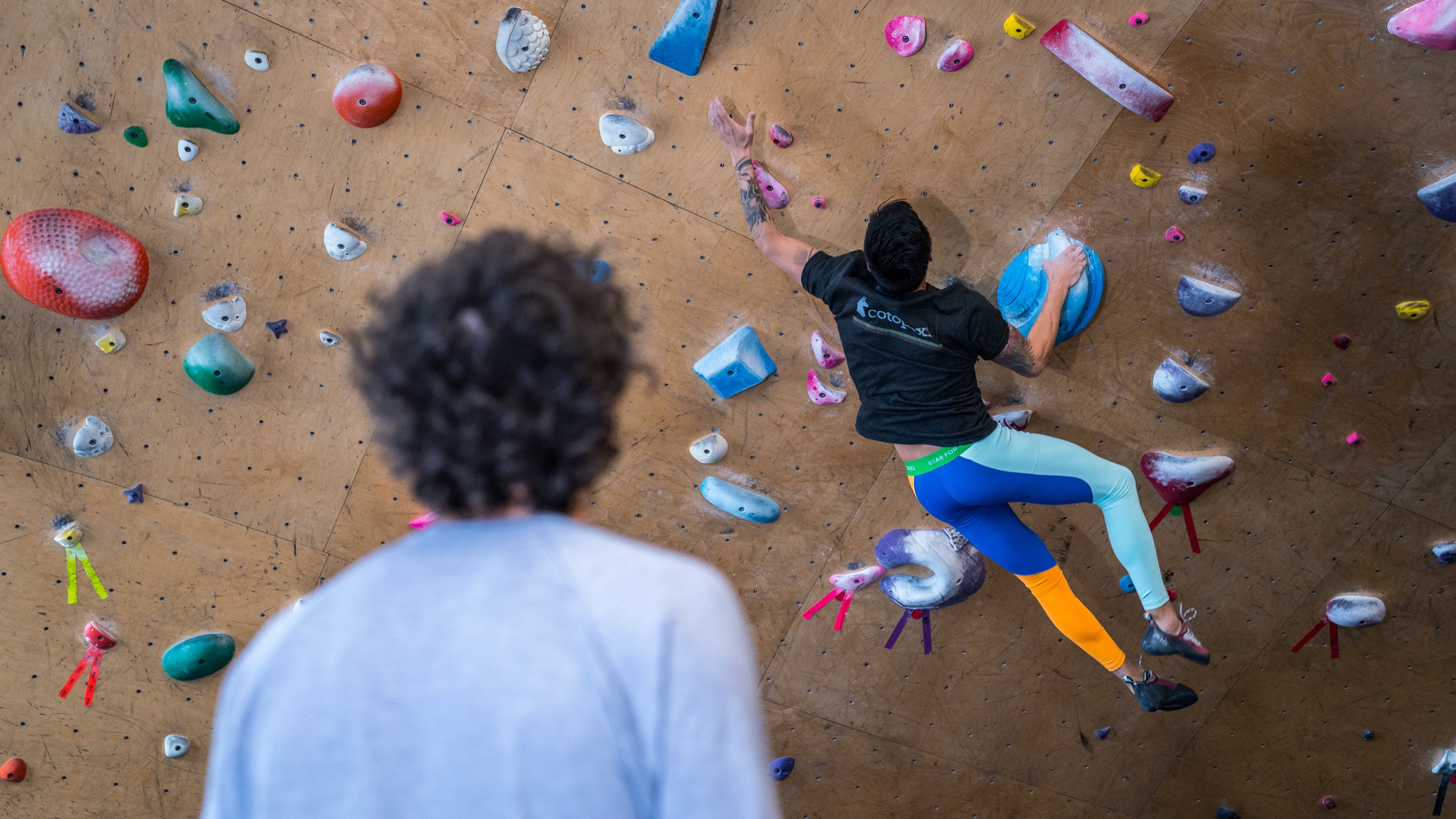 Cotopaxi has retained their signature color scheme on much of their activewear line. Haraku tights and Block tee shown.