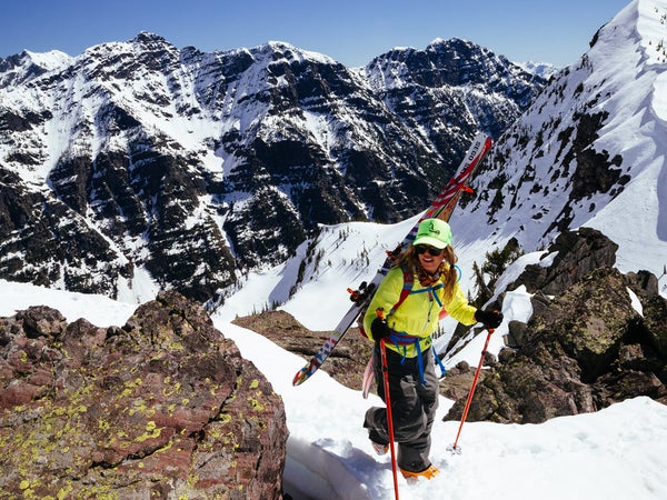 Lynsey Dyer hikes up for a run in Glacier National Park. She hasn't had children herself but has talked with other athletes who decided to start a family.