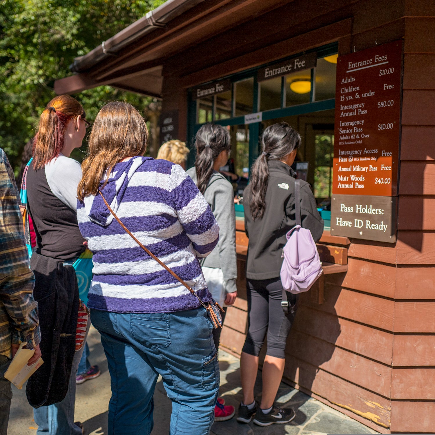 Tourists wait in line to pay entrance fees for Muir Woods National Monument, Mill Valley, California, September 5, 2016.