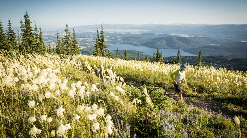 Trail running above the seven-mile glacial Whitefish Lake.