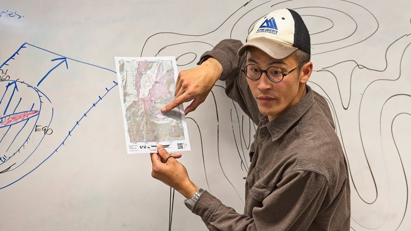 Don Nguyen demonstrates navigation with topo maps and compass at the Climbers of Color mountaineering workshop in Seattle, April 28.