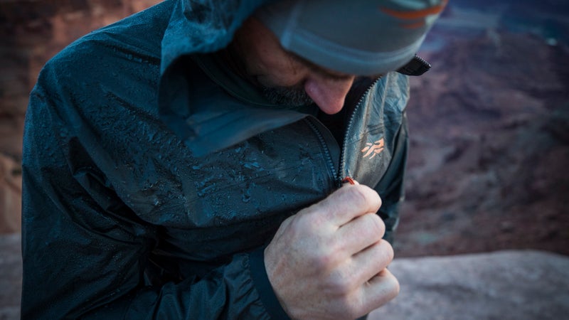 The jacket's feature set includes everything you need—robust, full-length zipper, zippered hand packets, hood adjustment—and nothing you don't.