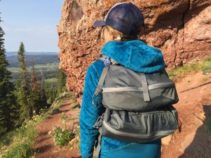 The author testing the REI Flash 45 and the Mystery Ranch Stein packs in Colorado.