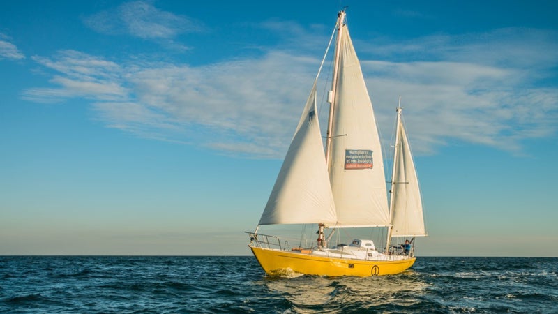 Antoine Cousot sailing aboard his Biscay 36 ketch rigged yacht.