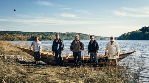 The expedition: (from left) Wilder Nicholson, the author, Ben Schott, John Abbott, and boatbuilder Rob Stevens launch their bateau on the Kennebec River outside Pittston, Maine