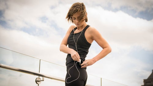 The two open-ended sheaths secure a phone and even a small wallet, and keep them from bouncing while you run.