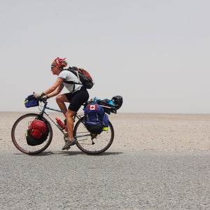 Kate Harris cycling through Tibet in 2006.