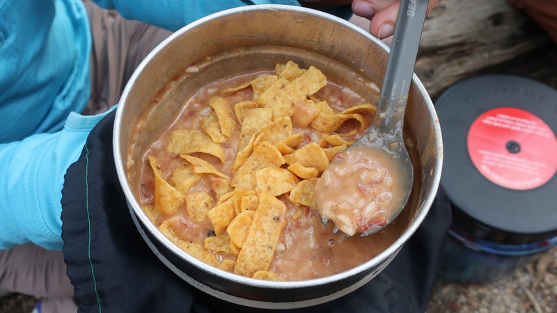 My favorite backpacking dish: beans & rice with Fritos and cheese. It does not go over as well at home, but it’s a winner in the field.