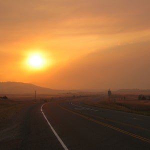 A dramatic sunset in Montana during a wildfire-caused road-walking detour.