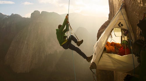 The Daily Commute: Climbers Tommy Caldwell and Kevin Jorgeson rely on a network of rigged ropes to move up and down the Dawn Wall of El Capitan in order to access the hardest pitches. They leave their portaledge camp each afternoon as the sun dips around the corner, and use mechanical ascenders to climb the ropes and go to work on the day's climbing adventure. After spending 19 days on the wall, Tommy Caldwell and Kevin Jorgeson reached the summit of El Capitan in Yosemite National Park for their historic first free ascent of the Dawn Wall on January 14, 2015.