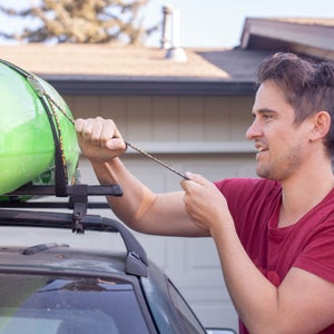 To make sure you don’t end up exchanging insurance info with a fellow driver, here are some pointers and a breakdown of how to properly affix everything from SUPs to bikes to the top of your car.
