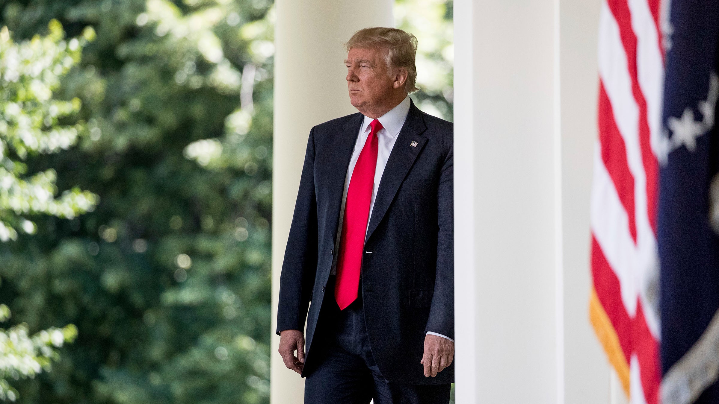 President Donald Trump arrives to speak about the U.S. role in the Paris climate change accord.