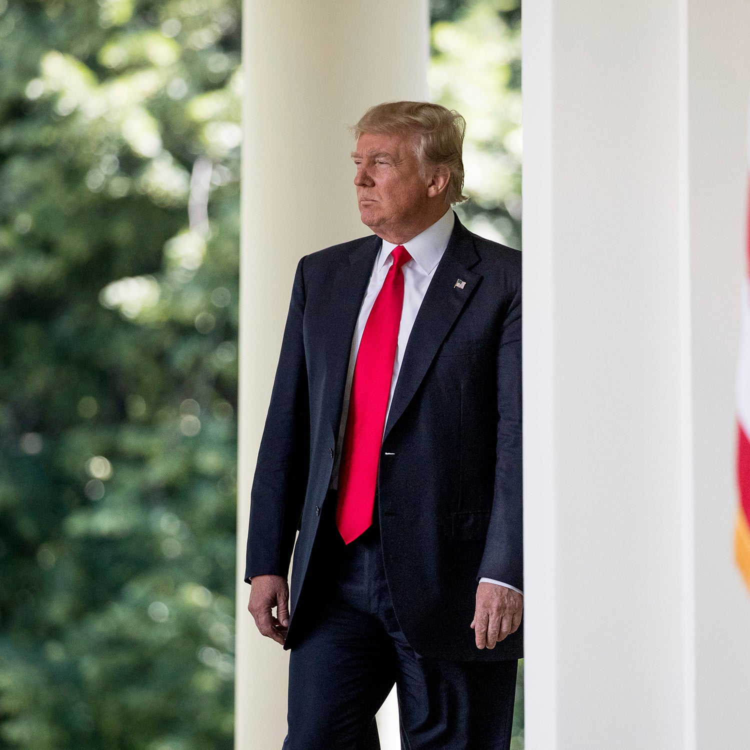 President Donald Trump arrives to speak about the U.S. role in the Paris climate change accord.