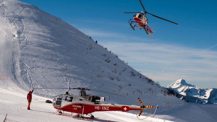 two helicopters run by Air Glacier who, along with Air Zermatt, worked to rescue the group by the Vignettes hut. red in the snow.