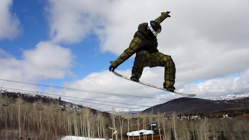 Shaun White snowboarding jump