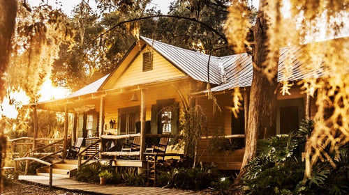 The Lodge at Little St. Simons Island in Georgia is one of our top choices for a log cabin getaway.