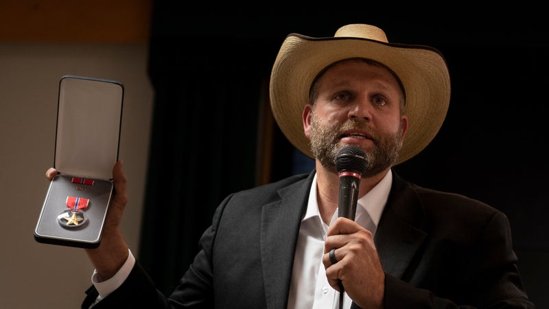 Ammon Bundy holds up a bronze star medal he says was given to him by a veteran during the Malheur National Wildlife Refuge standoff in early 2016.