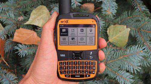 The SPOT X retails for $250, weighs 6.7 oz, and features a 2.7-inch dot matrix illuminated screen and physical QWERTY keyboard. It looks like an orange Blackberry with an over-sized antenna.