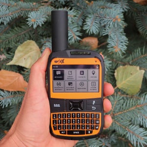 The SPOT X retails for $250, weighs 6.7 oz, and features a 2.7-inch dot matrix illuminated screen and physical QWERTY keyboard. It looks like an orange Blackberry with an over-sized antenna.