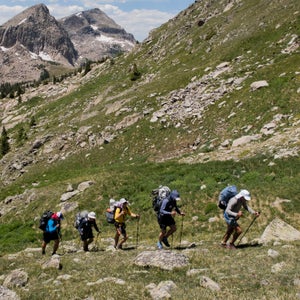 It had to be the poles. Buzz Burrell of Ultimate Direction guides a group of men half his age towards Boulder-Grand Pass in Rocky Mountain National Park.