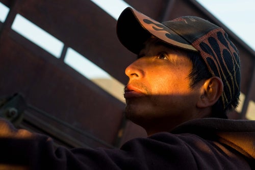 Casely DeLaCruz, 32, watches sheep as they are loaded into a truck near Moxee, Wash., Friday, May 13, 2016. Wool products are becoming more and more popular in the United States.聽The American Sheep Industry Association states that in 2007, 70 percent of American wool was exported. In 2017, only 50 percent was. Workers like Casely are increasingly valuable聽to the sheep industry in the United States. Peruvian migrant workers bring husbandry knowledge from their home country and fill jobs that American workers wouldn't normally take on.聽(Sofia Jaramillo)
