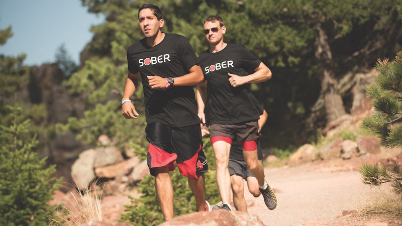 Two Phoenix members participate in a group run in Boulder last November