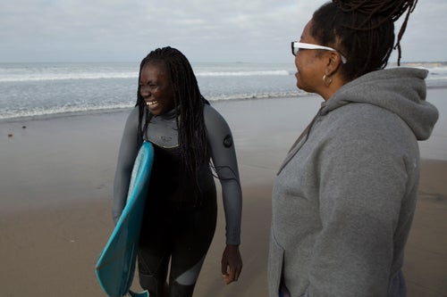 Harper has been a surf coach and competition judge for decades. Noticing a dearth of black women in the surfing community, in 2014 she founded Black Girls Surf, an organization that trains black women and girls to become professional surfers. She came across Sambe online in 2016 while looking at photos of surfers in Dakar. She noticed one woman who kept coming up in the photos and contacted local people to figure out who she was. At the time, Sambe was a surfing teacher at a camp and had dreams of going pro. The fact that Sambe was the only woman surfing in Senegal made it impossible for her to formally compete, so she was eager to travel elsewhere and connect with the world of professional female surfers.
Harper reached out to Sambe, and they were in contact for two years before Sambe finally came to the U.S. to start training, messaging every day on Facebook and Whatsapp. 鈥淓very single time we talked, Khadjou would ask when she was coming,鈥 says Harper. When Sambe landed at the San Jose airport this past July, she and Harper met for the first time. 鈥淏oth of us had these huge grins on our faces,鈥 says Harper. 鈥淭he first thing I thought was, 鈥楾his is my sister right here.鈥欌