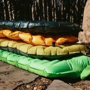 Camping with the right sleeping pad makes all the difference for a good night's sleep.