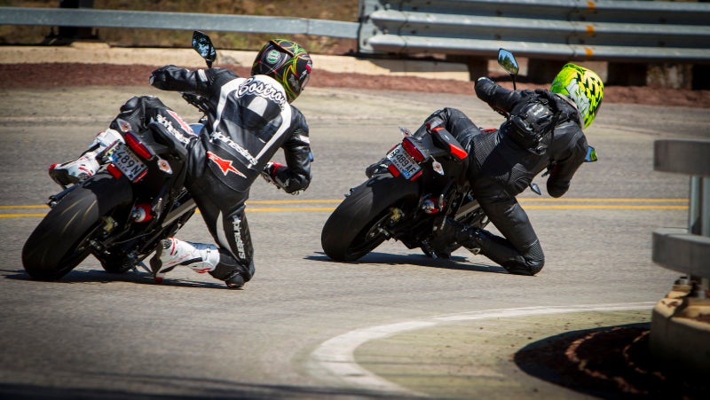 I've still got a framed version of this photo on my bookshelf. That's me in the green helmet, with EBoz following.