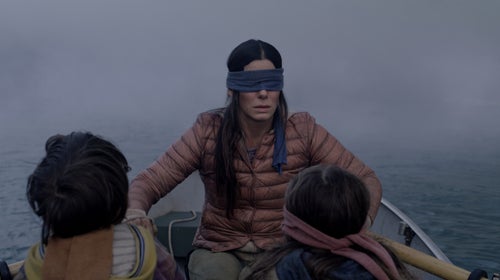 Sandra Bullock’s character, Malorie, paddles bravely in her mauve puffy jacket in 'Bird Box.'