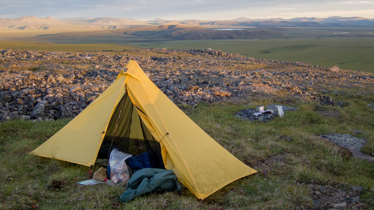 https://cdn.outsideonline.com/wp-content/uploads/2019/01/16/yukon-arctic-campsite-sunset_h.jpg?width=1200