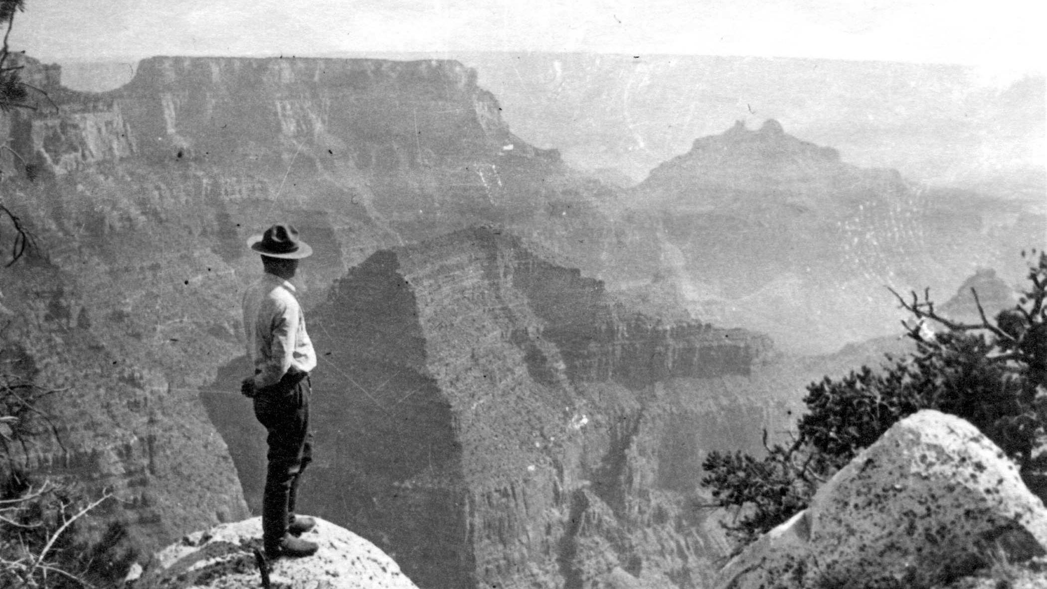 A ranger surveys the Grand Canyon. 