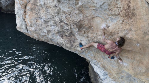 Chris Sharma climbing in Dibba, Oman on December 8, 2017 during the Red Bull Psicobloc 2017.