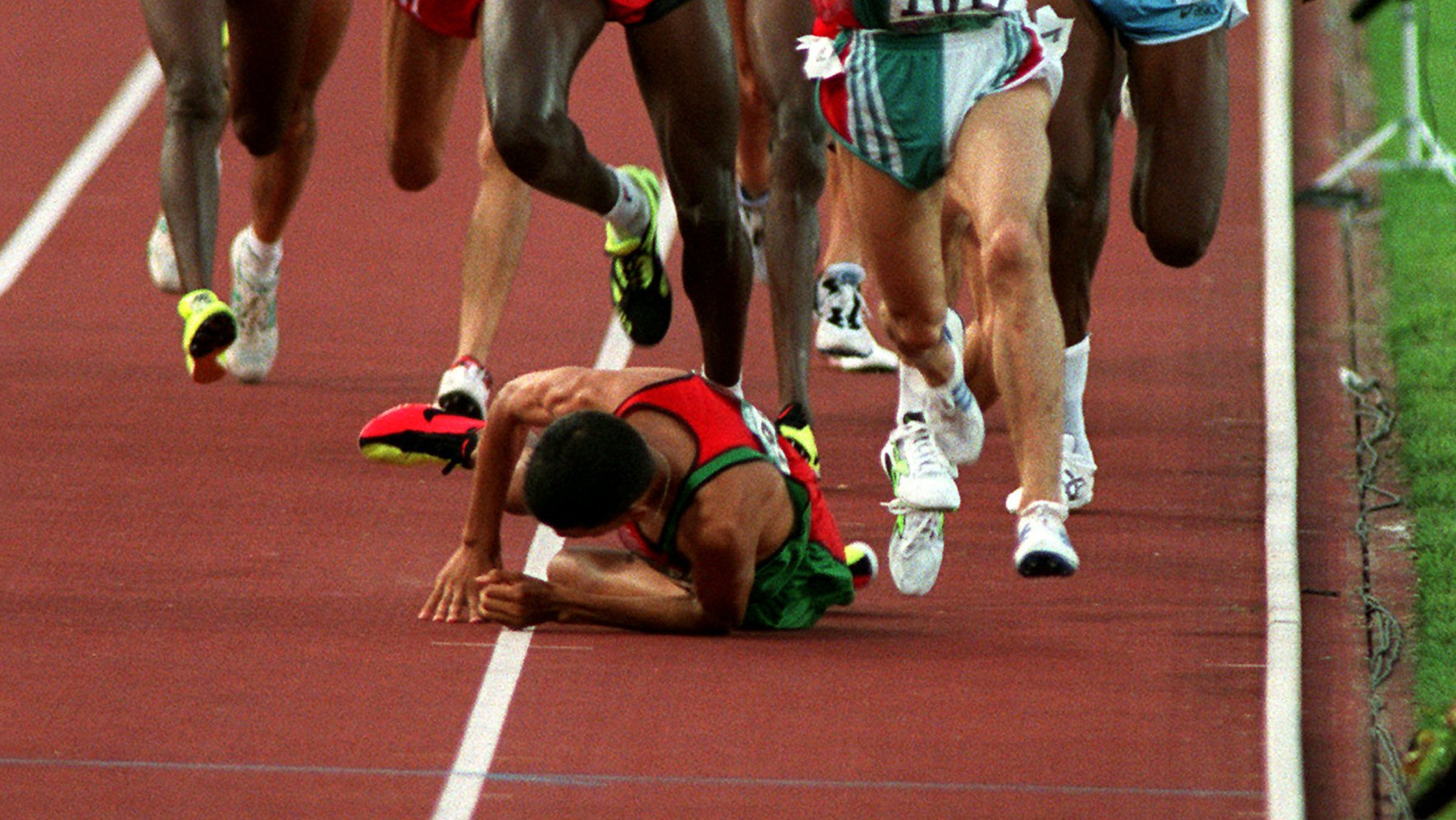 El Guerrouj of Morocco after he tripped and fell in the men's 1500 meter final.