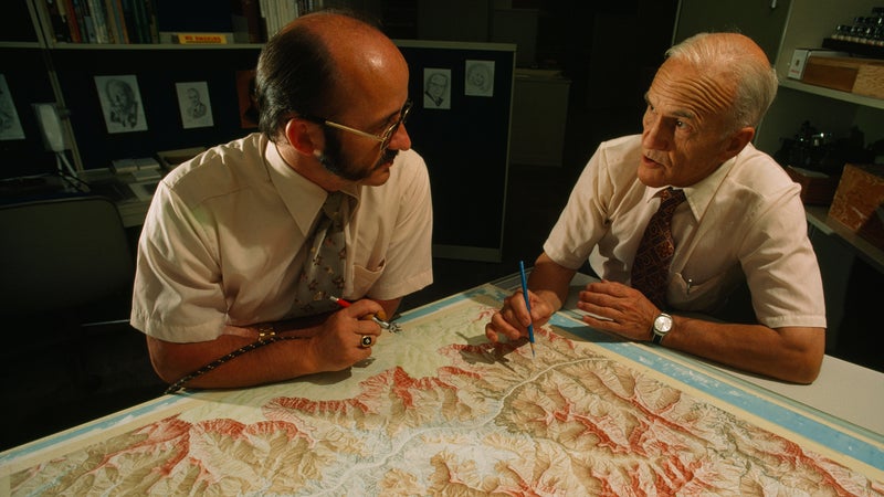 Washburn, right, discusses relief shading with National Geographic cartographer Tibor Tóth as they work on the Grand Canyon map. Washburn was involved with every aspect of the creation of the map.