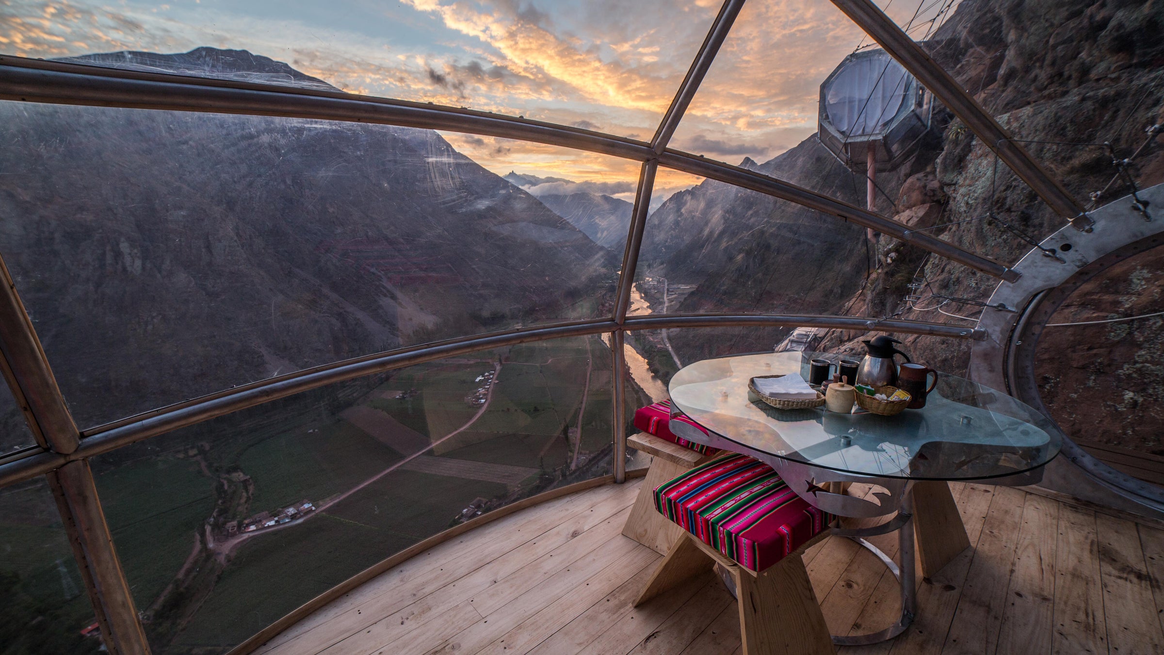 In the Sacred Valley of Peru you can climb 13,000 feet up a Via Ferrata and spend the night in a glass capsule on the side of a cliff.