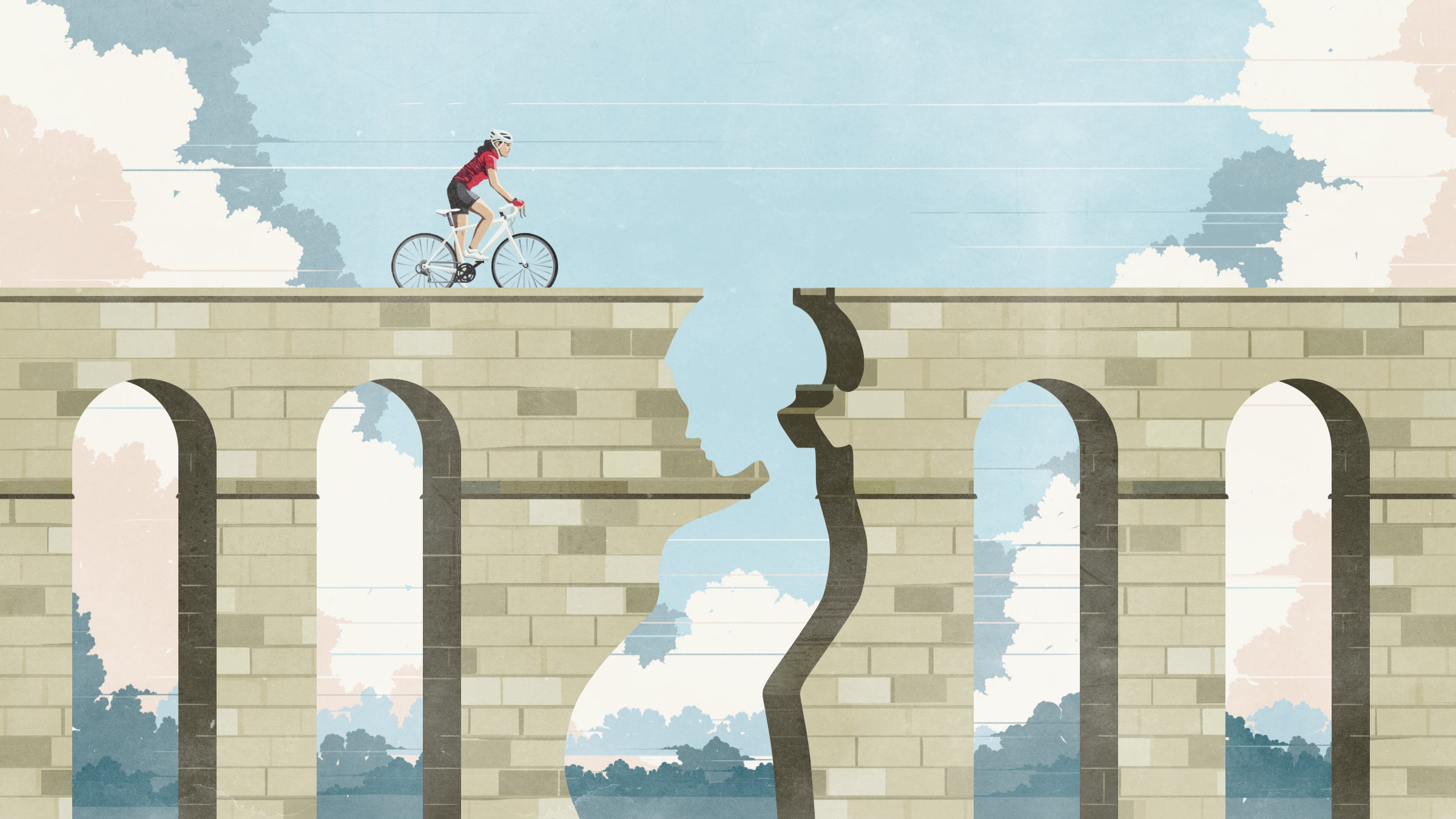 woman riding bike toward cliff