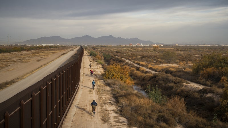 'The River and the Wall' team biking along the U.S.-Mexico border.