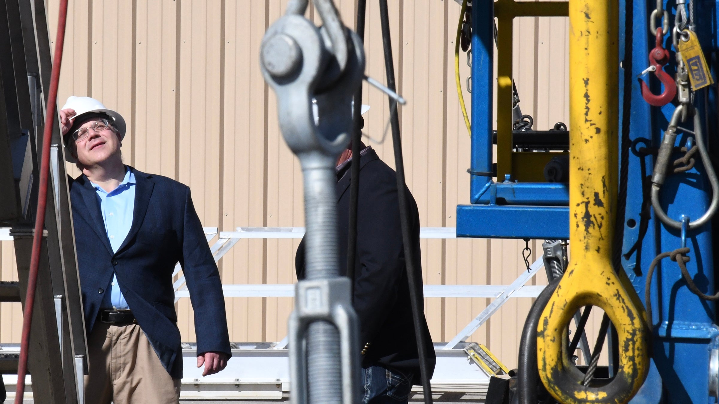 Bernhardt examines oil rig equipment in New Mexico. 