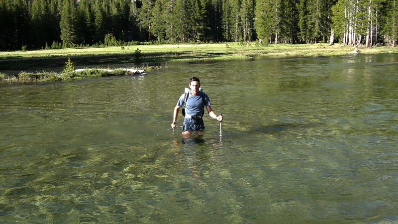 Crossing Evolution Creek in California’s Evolution Meadow. The water was waist-deep and frigid but slow-moving. At the official trail crossing further downstream, it was swift and would have been a swim.