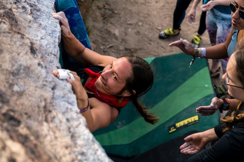 Erynne M. Gilpin, founder of @indigenouswomxnclimb, channels laser focus at the Happy Boulders.