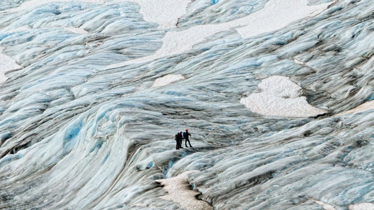 two people on a huge glacier hike